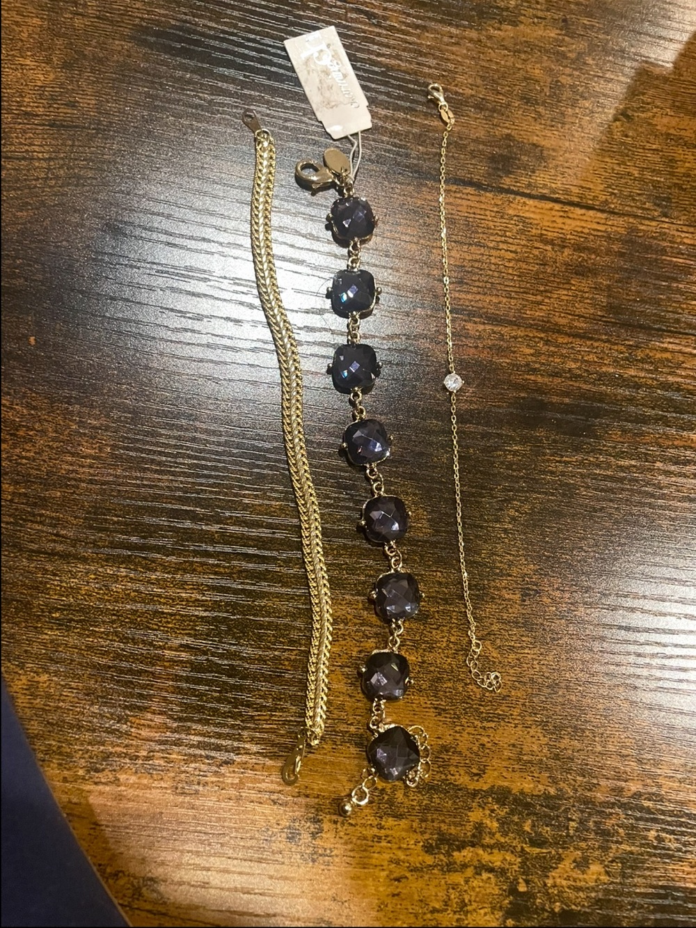 Gold-Tone Bracelet with Dark Purple Crystal Accents
